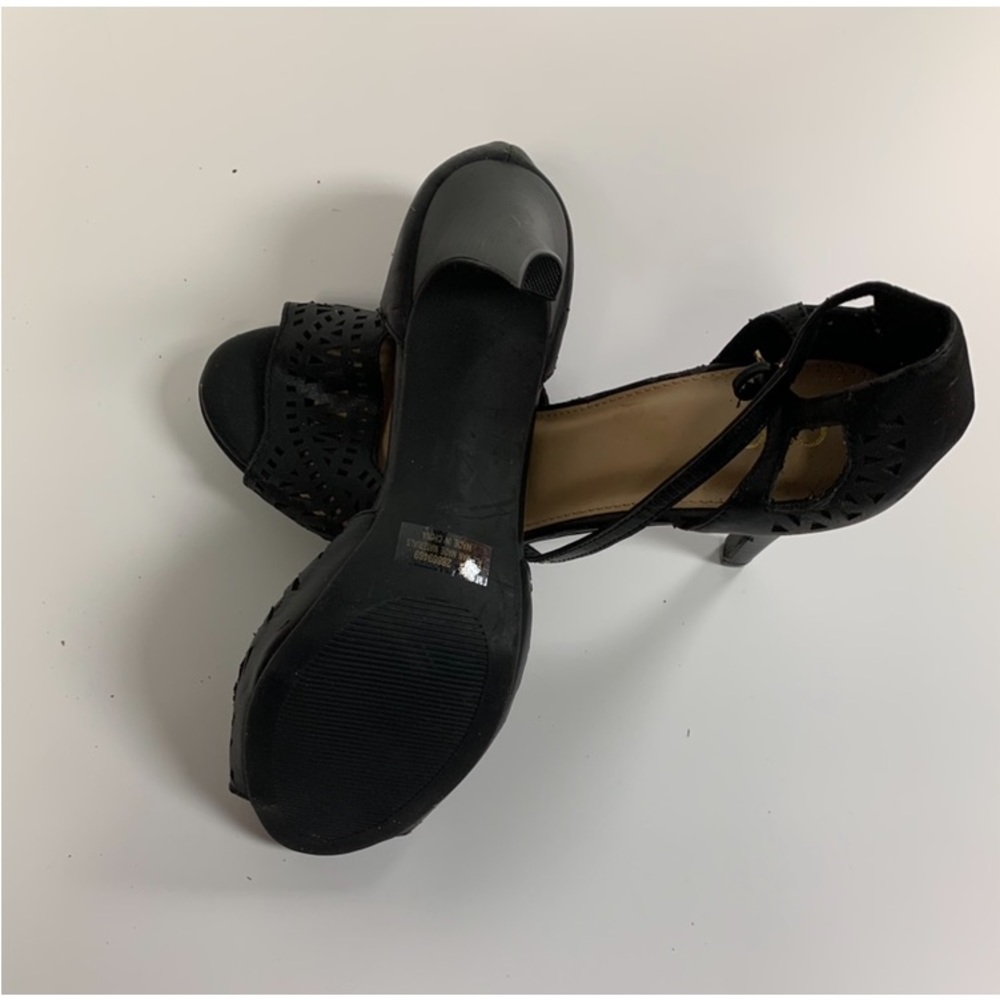Open toe shoes/sandals. They are black with 4 inch herl